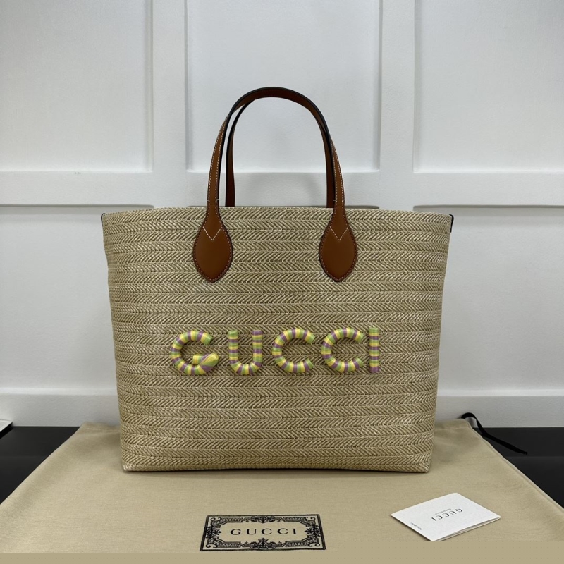G*u*i shopping bags
